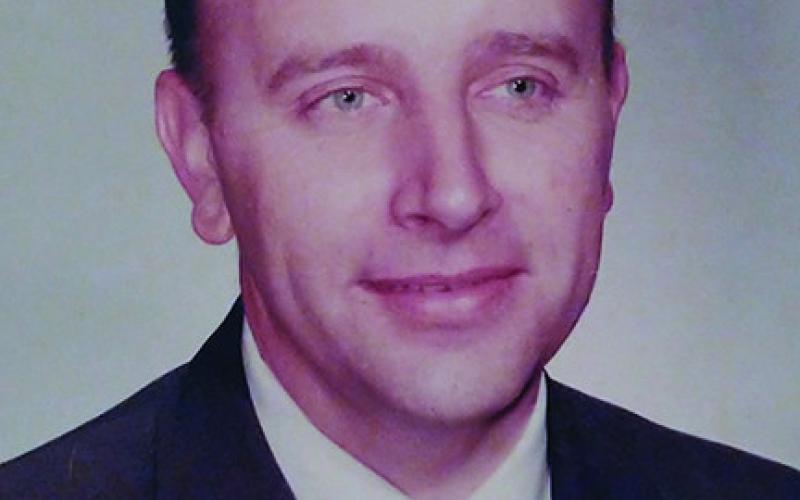 MARTIN L. MEUSER