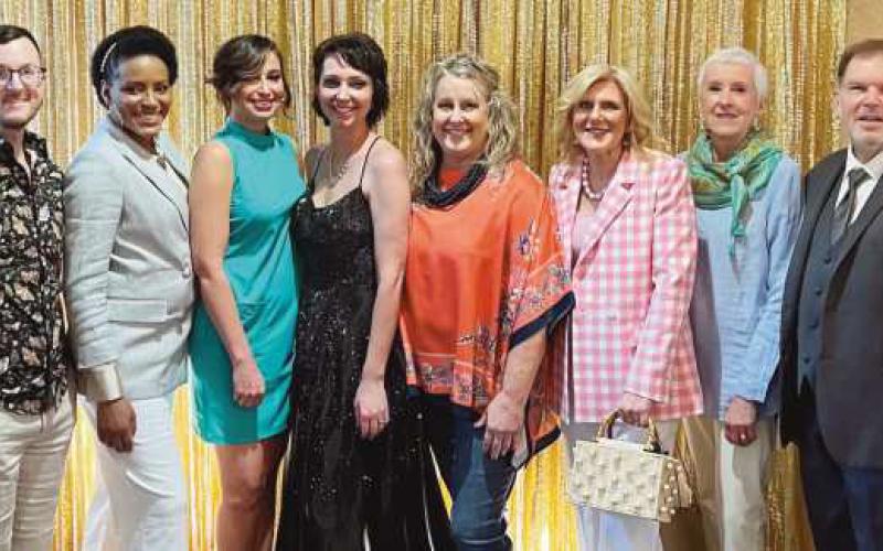 Featured survivor models, from left, Bradley Allan, Whitney Valencia, Eunice Agnew, Jen Straley, Missy Johnson, Kris LaHote, Julie Gunderson and Jim Perlman.