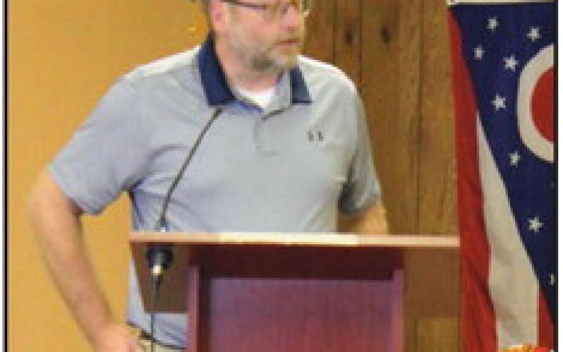 Chris Smalley, Wood County Park District director, addresses the trustees, seeking their support for a grant to purchase property adjacent to Reuthinger park.