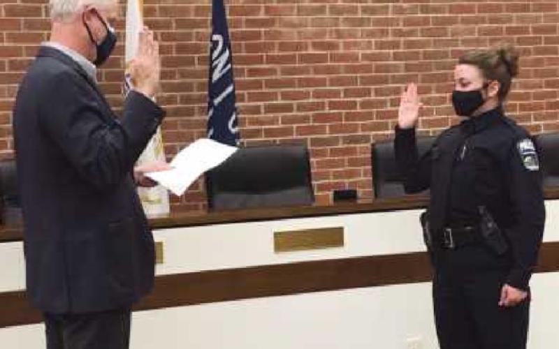 New police officer sworn in by Mayor Tom Mackin