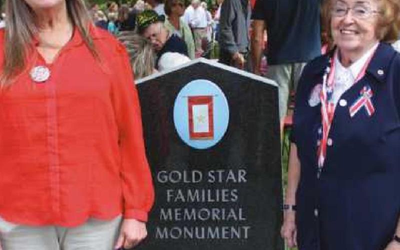 Darlene Dunlap, left, and Sharon Belkofer, visit the Gold Star Families memorial.