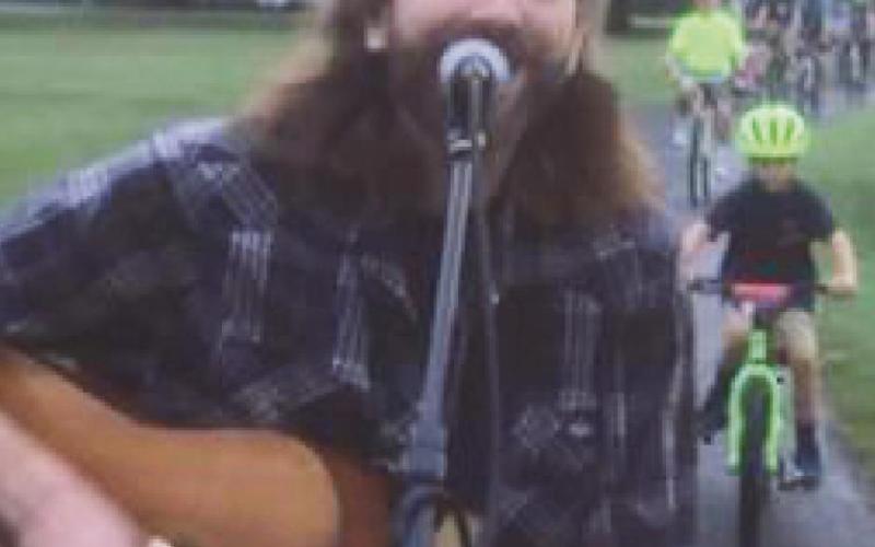 Musician Slim will entertain cyclists participating in the Slow Roll on August 1.