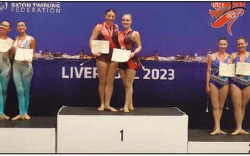 Local twirlers win international gold