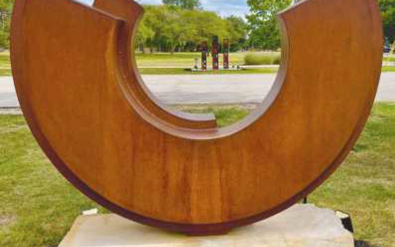 “Inverted Arch #6” by Ken Thompson earned first place honors at the Perrysburg Sculpture Walk at Woodlands Park.