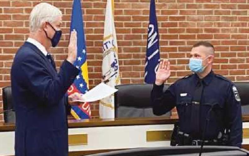 Police division promotes, adds officers