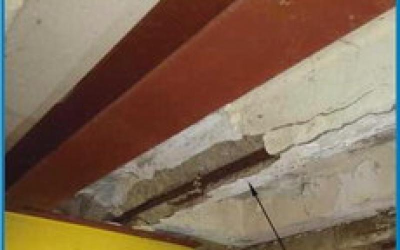 This image shows the concrete support deterioration and the I beam reinforcements at Otsego Hall.