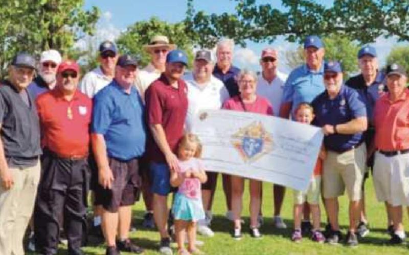 St. John XXIII Knights of Columbus donate funds to the Cocoon shelter