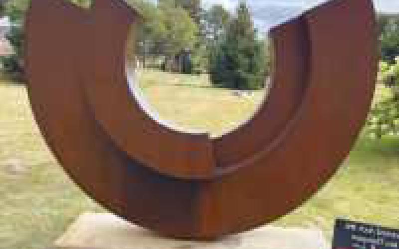 First Place winner, “Inverted Arch #6,” by Ken Thompson. Below, Second Place winner, “Hurrying Home,” by Charles Brouwer.