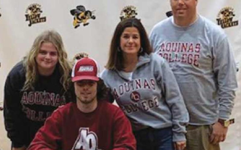 Will Blanchard, lacrosse, Aquinas College, with parents Anne and Marc Blanchard and sister Kathryn.