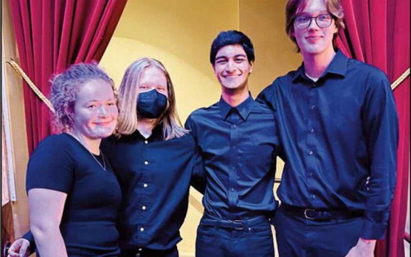 PHS orchestra students perform with Beatles vs. Stones show