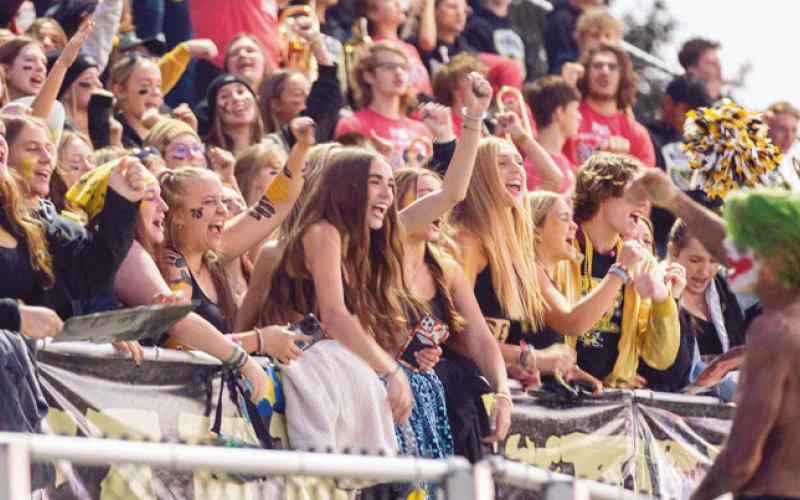 Perrysburg High School’s fan section cheered on the Yellow Jackets for the final NLL contest against their cross-river rival Maumee.