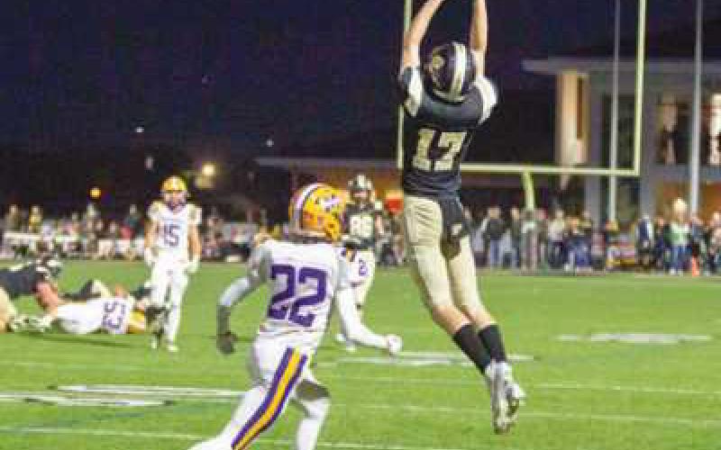 Wide receiver Gavin Fenneken makes a leaping catch.