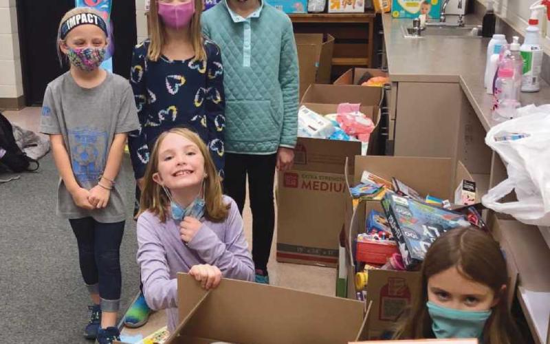 Toth Elementary students Lucy Crumbaugh, Jillian Allesee, Clara Humphrey, Sullie Morrison and Morgan Fornwald held a drive to support Mom’s House. They collected more than 1,400 items.