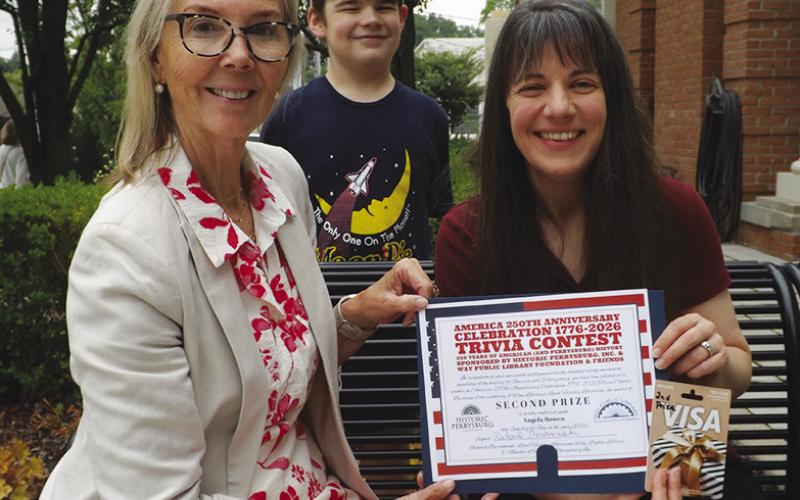 Second prize winner of $150 was Angela Bowen, pictured with her son Easton, and Joy Studer, president of Historic Perrysburg Inc.
