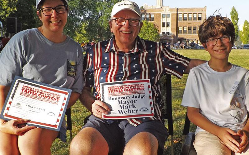 Third place winner of $100 is Kimberly Rogers. She is pictured with Perrysburg Mayor Mark Weber and her son, Jairon. Weber was an honorary judge.