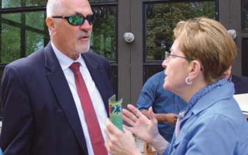 Congresswoman Marcy Kaptur discusses with Rex Huffman, Wood County Port Authority, funding for a proposed pedestrian/bike path bridge spanning the Maumee River and connecting Lucas and Wood counties’ trail systems.