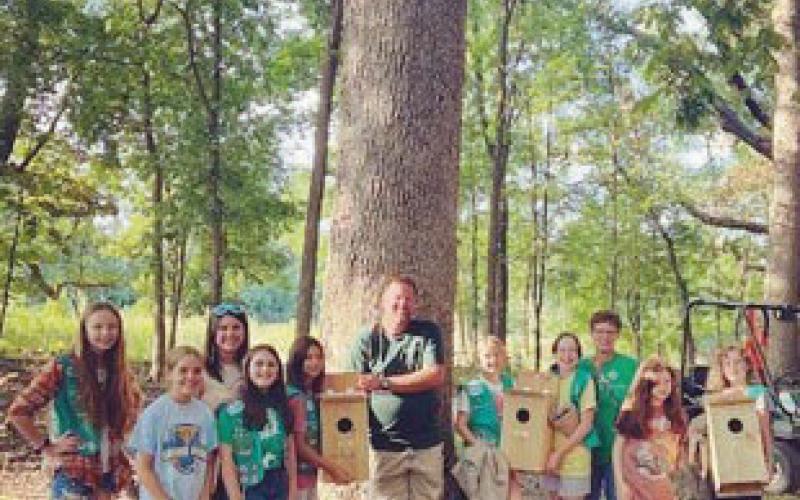 Junior Girl Scouts complete project