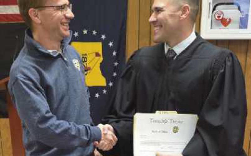 From left: Newly-elected Trustee Dr. Jeffrey Moore with Wood County Common Pleas Judge Joel Kuhlman.