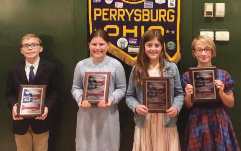 Pictured are the winners of the Perrysburg Exchange club Patriotism Essay Contest, from left to right: Gregory Dubois, Saint Rose; Zoey Zimmerman, Lizzy Wronkowicz and Miah Dario, 5th Grade, Hull Prairie Intermediate. Not pictured: Noah Heinlin.