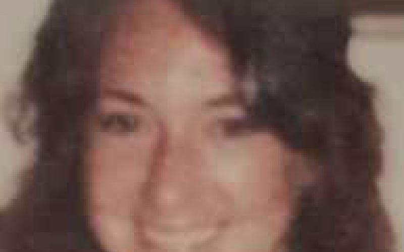 ANDREA J. SPORE