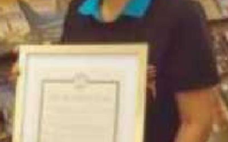 Home for the Holidays parade grand marshal is beloved community member