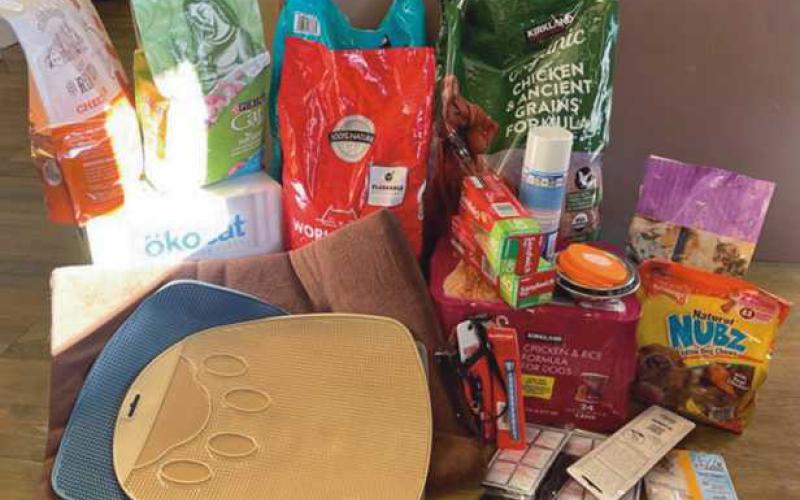 Area residents donate supplies for sheriff’s dept. pet food drive
