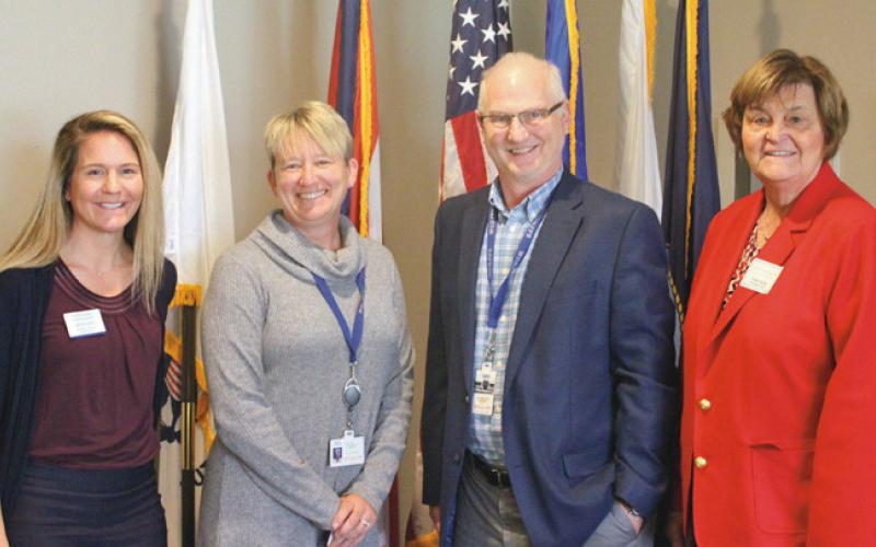 From left are chamber board member Lindsay Buker of Skotynsky Financial Group, workforce administrator Mary DeWitt of OhioMeansJobs Wood County, senior workforce consultant Pete Prichard of Wood County Educational Services Center and Wood County Commissioner Doris Herringshaw.