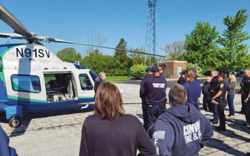 Pilot Meghan Newyear instructs first responders on helicopter landing zone safety.