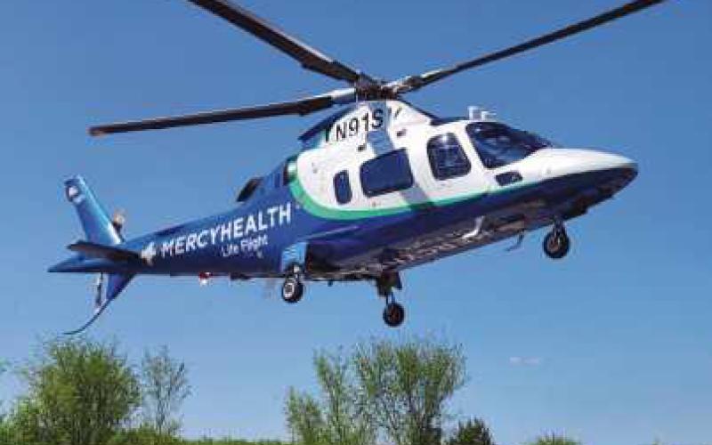 Agusta AW109E Power helicopter taking off from Perrysburg Township.