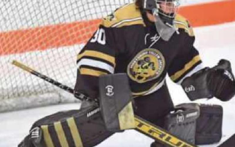 MacKeane Hanley (above left) “stepped into the limelight at the most crucial of times to win the game,” said Coach Kevin Fisher, adding, “Junior goaltender Sam Yonker (above right) led the way most of the evening.”