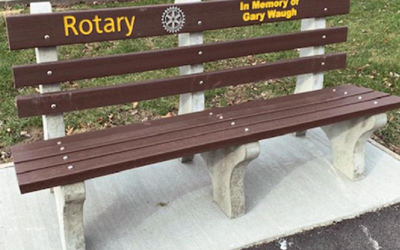 Penta construction students remodel bench for Waterville Rotary Club