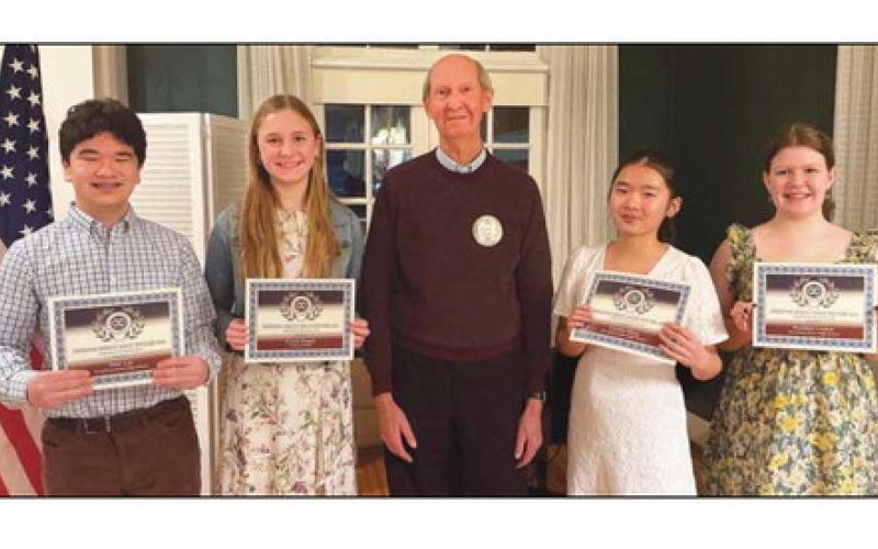From left: Peter Lee, Perrysburg Junior High School; Gracie Borgelt, St. Rose; Bob Obrock, Perrysburg Exchange Club president; Cynthia Wang, PJHS, and Brooklyn Lindow, PJHS.