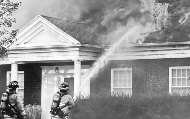 Secor Woods house fire starts in garage