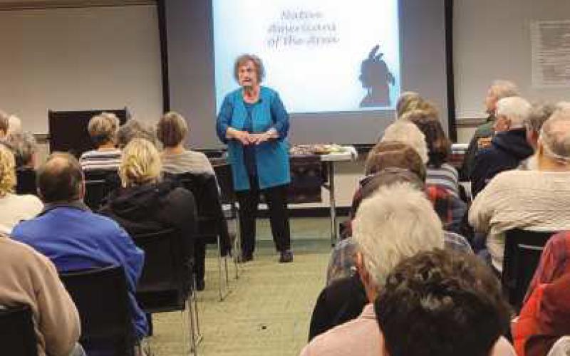 Mrs. Justus spoke to a full house on February 19.
