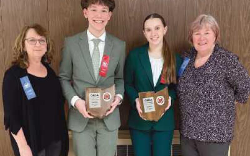 From left, coach Jennifer Nagy Lake, State qualifiers Seth Ermie and Sydney Wolfinger and assistant coach Debra Kemp.