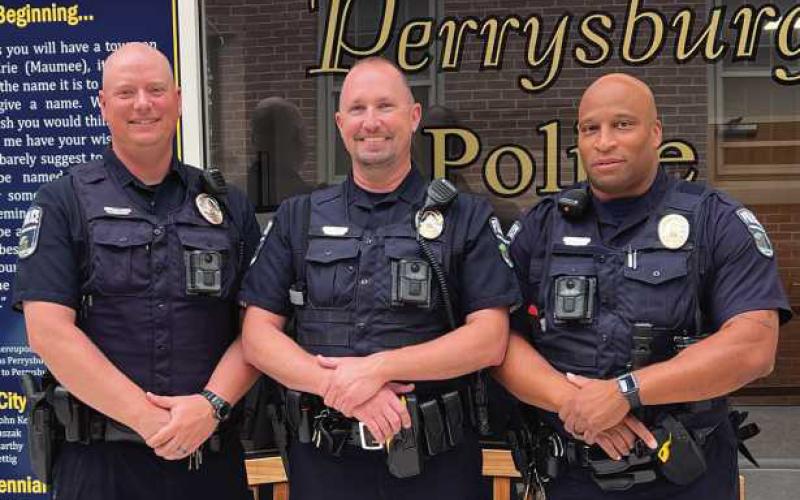 From left are Perrysburg Exempted Village School District Officer Greg Cole, school resource officer at Perrysburg High School; Officer Brad Dayton, Perrysburg Junior High SRO, and Officer Charles Sims, Hull Prairie Intermediate SRO.