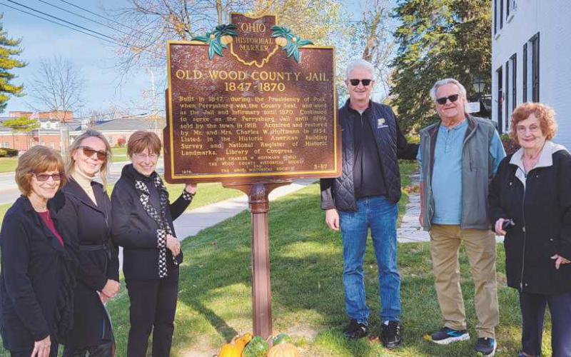 Dedicating the new marker were HPI board members with Mayor Mackin. Pictured, from left: Joanie Graver, Joy Studer, Sharon Hoffmann, Mayor Tom Mackin, Dave Kleeberger and Judy Justus.