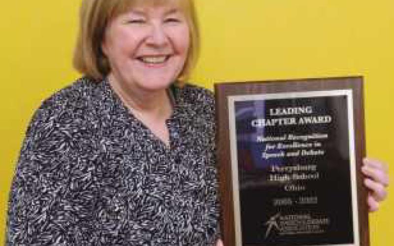 Coach Debra Kemp with the Leading Chapter Award presented to PHS.