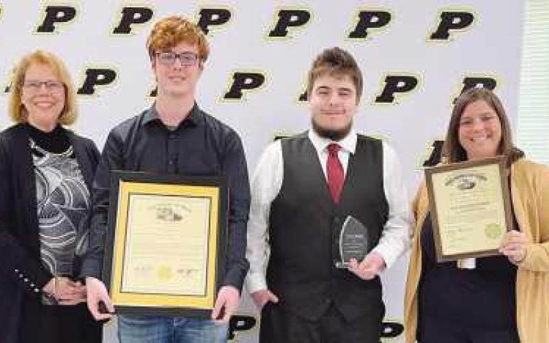 From left: Board member Sue Larimer, Colten Ruemmele, Jackson Kicinski and PHS College and Career Readiness Instructor Analisa Williams. Not pictured: Cheyenne Irwin, Aaron Linkes and Marwa Sediqe.