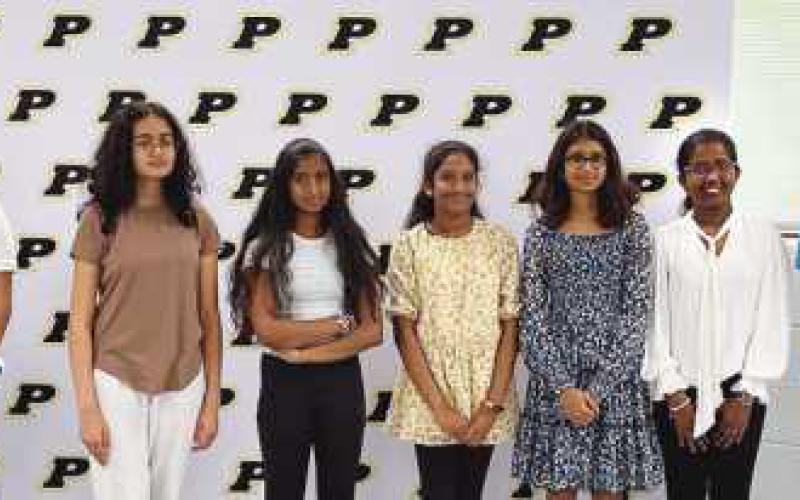 From left: Board member Chris Anderson, Pranav Polu, Aaryaa Mehta, Snigdha Kumar Kamireddi, Teertha Sahasra Katamurri, Manasvi Indraganti, Avnitha Rajesh, Olivia Boice and Science Fair Advisor Corbin Brangham. Not pictured: Ishan Navuluru and Gauri Pandav.