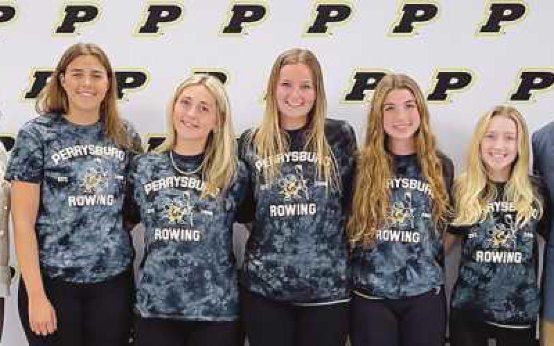 From left: Board member Laura Meinke, Katherine Cromly, Tatum Takats, Ava Rantanen, Emma Brancheau, Tori Grayson and Head Coach Ethan Peters.
