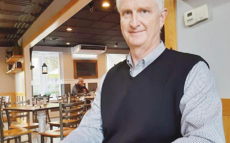 Mayor Tom Mackin shared thoughts about his first and second terms during a visit in Lamplight Cafe.