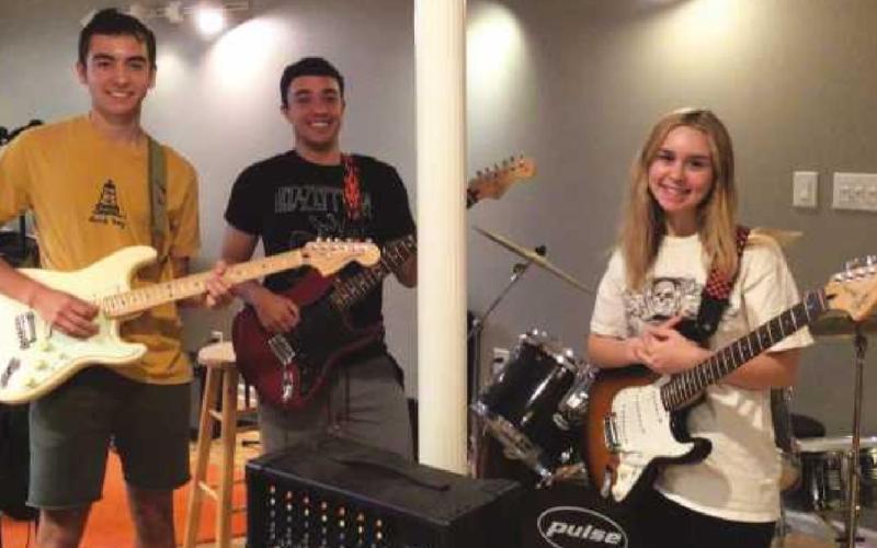 Ricardo Amezquita-Cadavid on guitar, Jack Terry on guitar, Merritt Backus on guitar and keyboard and Autumn Edwards, on drums (not pictured).
