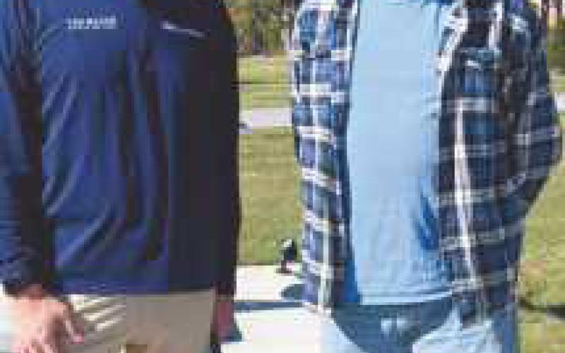 Michael Young, pictured with Mayor Mackin, earned second place for “Quantum Flock.”