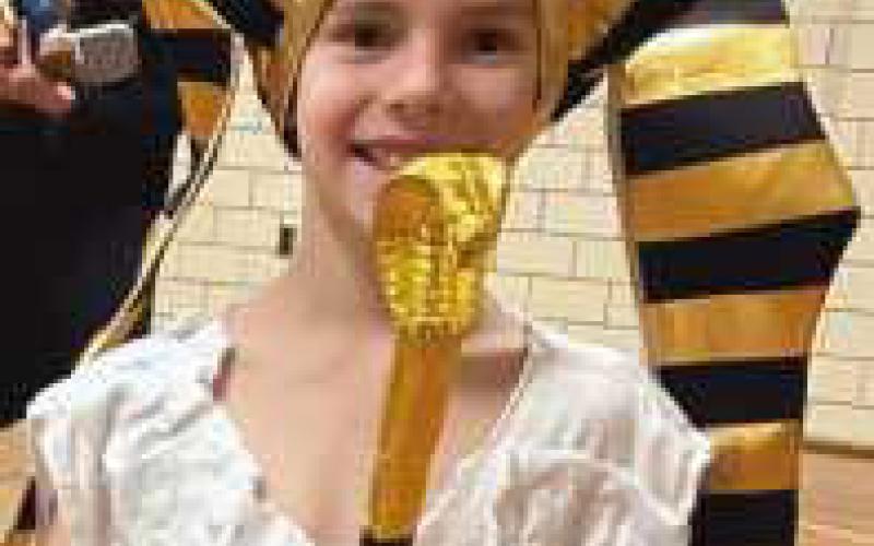 Toth third graders present biography wax museum