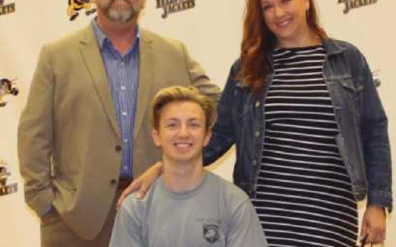 Marc Boroncini will run track and cross country at the U.S. Military Academy West Point, where he plans to major in political science. Pictured with him are his parents Chris and Beth.
