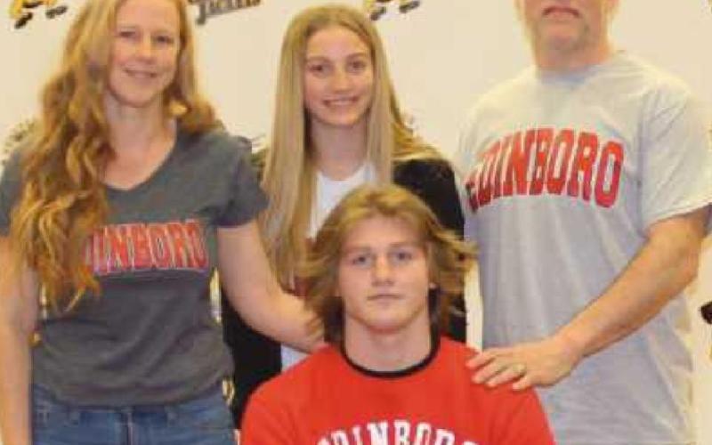 Alex Garee will wrestle for Edinboro University where he plans to major in political science. Pictured with him are his parents Robert and Michelle and his sister Grace.