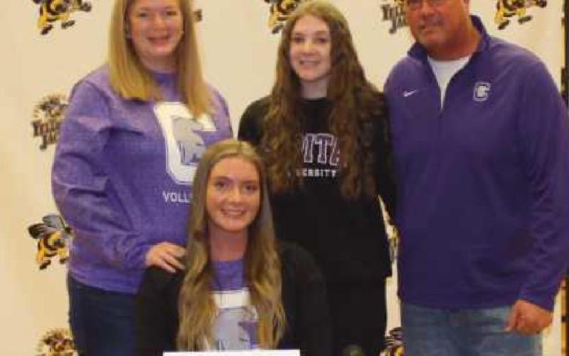 Linden Kunick will play volleyball for Capital University where she plans to major in athletic training. Pictured with her are her parents Jay and Marcie and her sister Raegan.