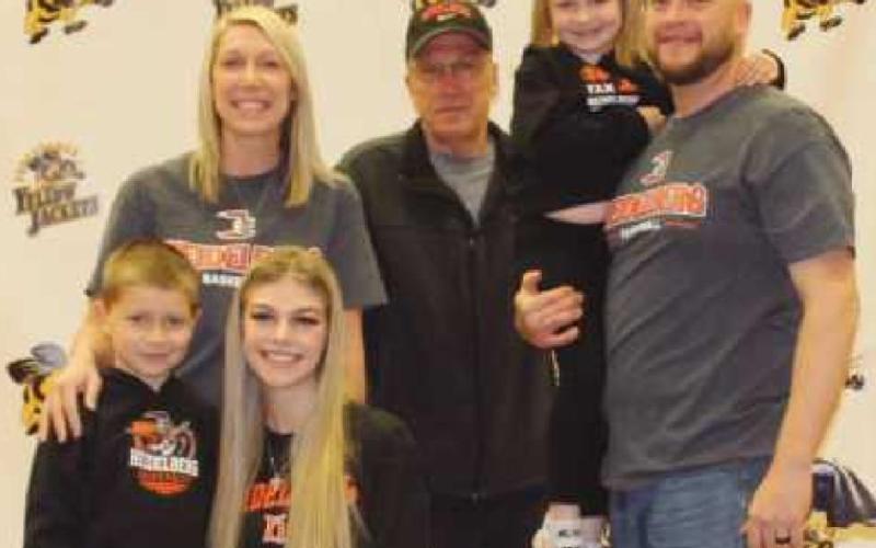 Marissa Thomas will play basketball for Heidelberg University, where she plans to major in education. Pictured with her are her parents Pete and Angie, grandfather Fred Whaley, and siblings, Nolan and Avery.