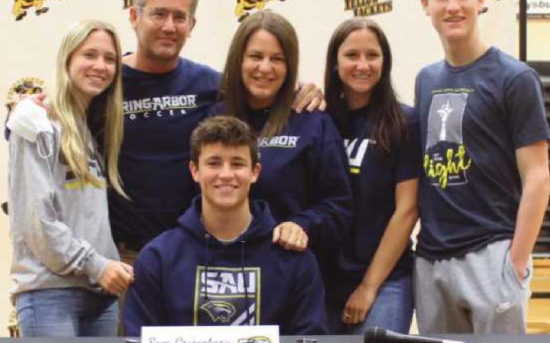 Sam Crisenbery will play soccer for Spring Arbor University where he plans to major in exercise science. With him are his parents Marc and Traci, his brother, Ian, and his sisters Grace and Emma.